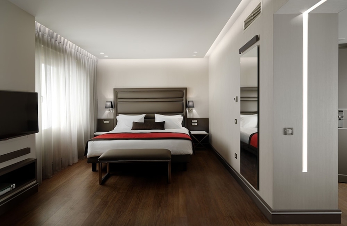 Imagen de la habitación del Hotel Holiday Suites, Atenas. Foto 9