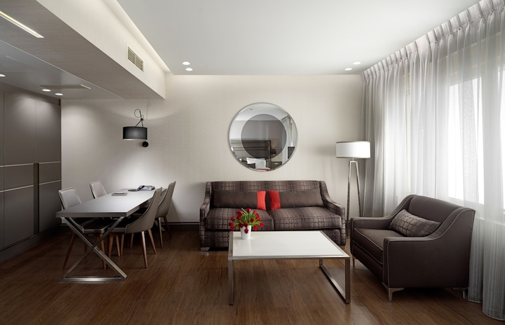 Imagen de la habitación del Hotel Holiday Suites, Atenas. Foto 16