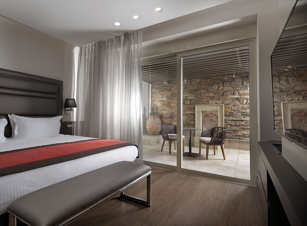 Imagen de la habitación del Hotel Holiday Suites, Atenas. Foto 17