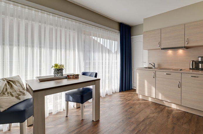 Imagen de la habitación del Hotel Holiday Suites De Haan. Foto 2