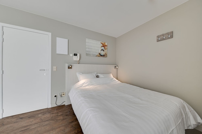 Imagen de la habitación del Hotel Holiday Suites De Haan. Foto 3