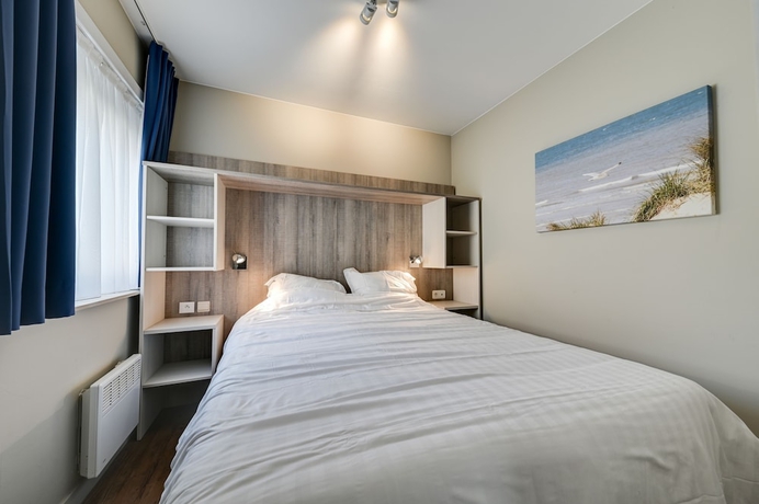 Imagen de la habitación del Hotel Holiday Suites De Haan. Foto 5