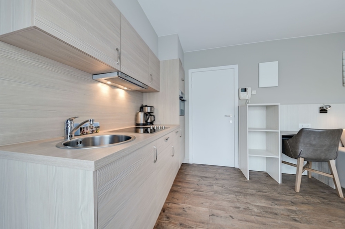 Imagen de la habitación del Hotel Holiday Suites De Haan. Foto 8
