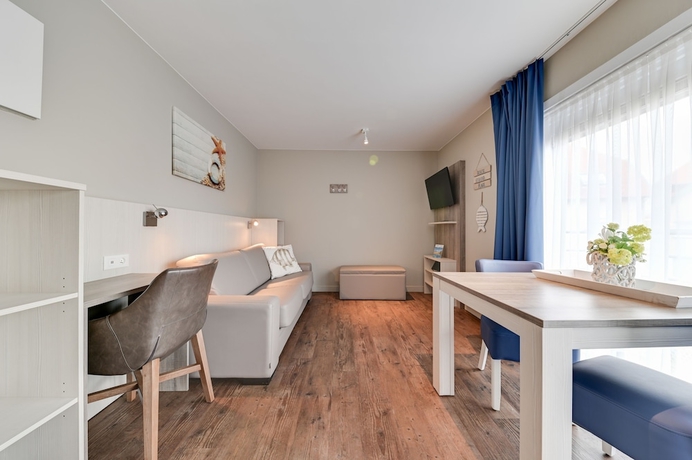 Imagen de la habitación del Hotel Holiday Suites De Haan. Foto 10