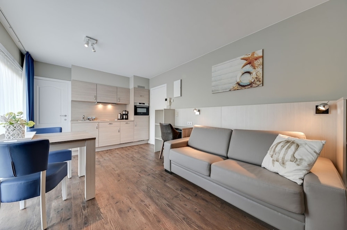 Imagen de la habitación del Hotel Holiday Suites De Haan. Foto 11