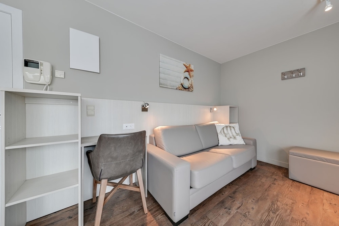 Imagen de la habitación del Hotel Holiday Suites De Haan. Foto 12