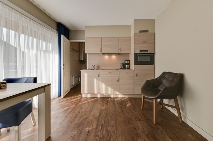 Imagen de la habitación del Hotel Holiday Suites De Haan. Foto 13