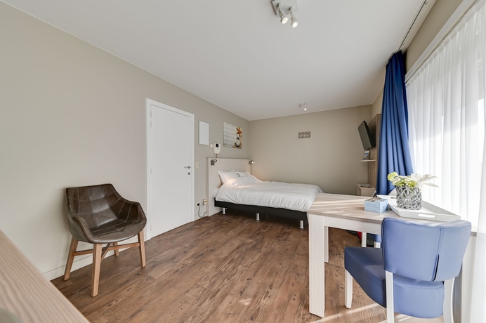 Imagen de la habitación del Hotel Holiday Suites De Haan. Foto 14