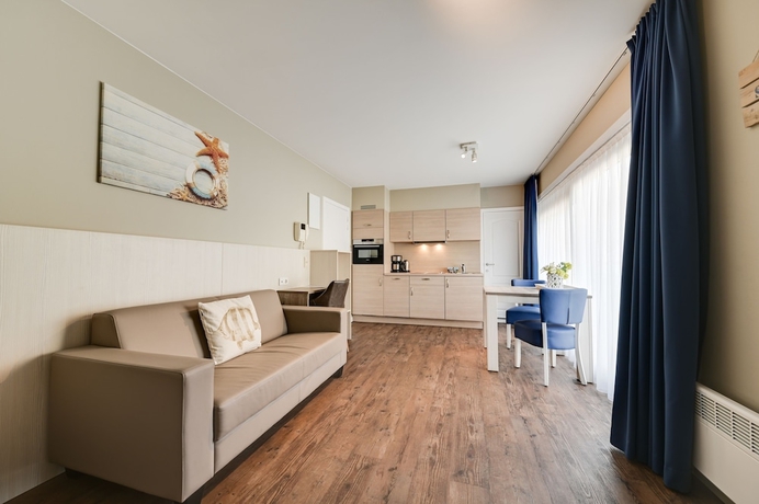 Imagen de la habitación del Hotel Holiday Suites De Haan. Foto 16