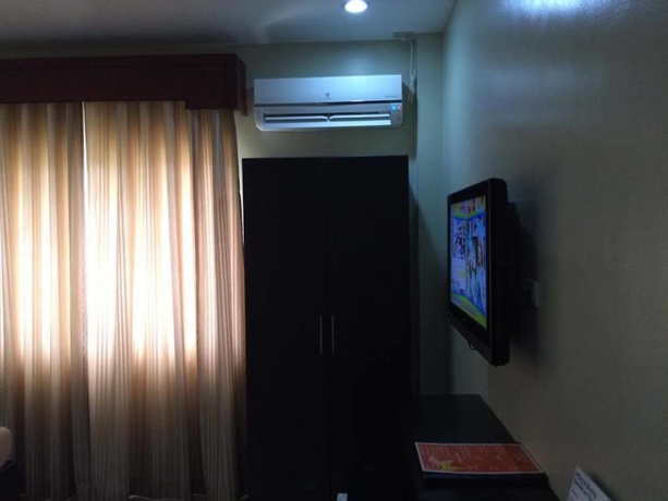 Imagen de la habitación del Hotel Holiday Suites Puerto Princesa. Foto 4