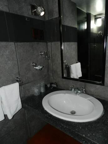Imagen de la habitación del Hotel Holiday Suites, Tacna. Foto 20