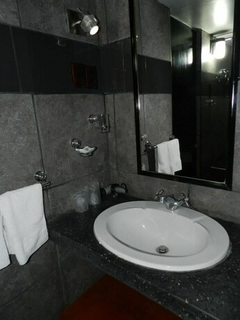 Imagen de la habitación del Hotel Holiday Suites, Tacna. Foto 24