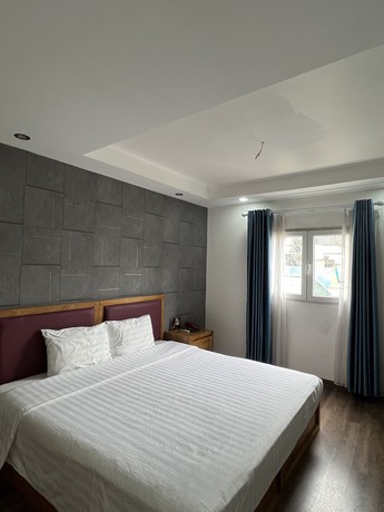 Imagen de la habitación del Hotel Holiday Suites & Spa. Foto 5