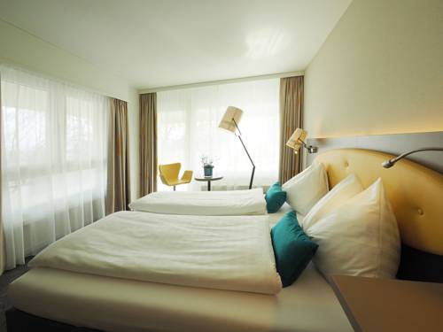 Imagen de la habitación del Hotel Holiday, Thun. Foto 2