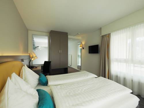 Imagen de la habitación del Hotel Holiday, Thun. Foto 3