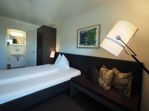 Imagen de la habitación del Hotel Holiday, Thun. Foto 10
