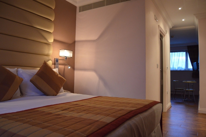 Imagen de la habitación del Hotel Holiday Villa. Foto 13