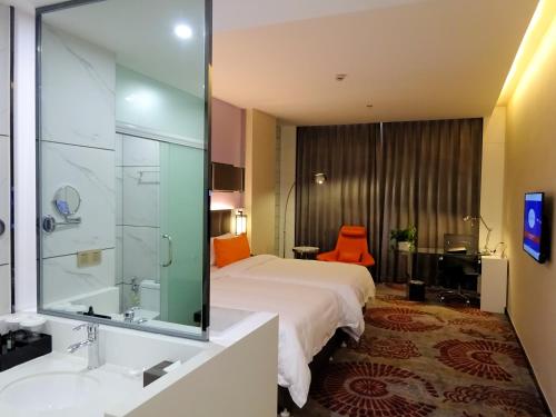 Imagen de la habitación del Hotel Holiday Villa Hotel and Residence Shanghai Jiading. Foto 7