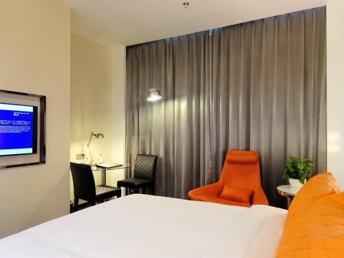 Imagen de la habitación del Hotel Holiday Villa Hotel and Residence Shanghai Jiading. Foto 9