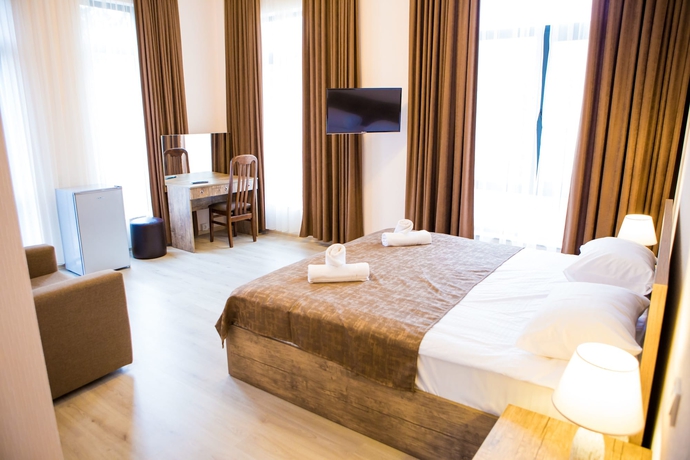Imagen de la habitación del Hotel Holiday Villa, Tbilisi. Foto 8