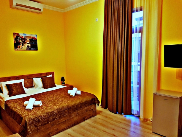 Imagen de la habitación del Hotel Holiday Villa, Tbilisi. Foto 10