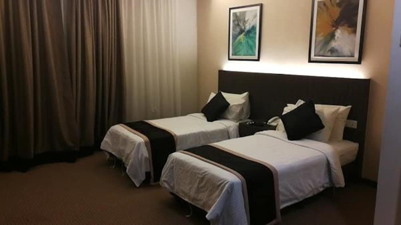 Imagen de la habitación del Hotel Holiday Villa & Suites. Foto 2