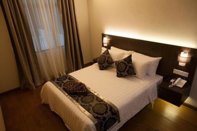 Imagen de la habitación del Hotel Holiday Villa & Suites. Foto 5