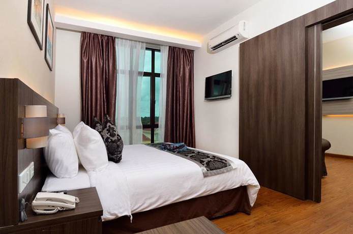 Imagen de la habitación del Hotel Holiday Villa & Suites. Foto 8