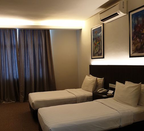 Imagen de la habitación del Hotel Holiday Villa & Suites. Foto 11