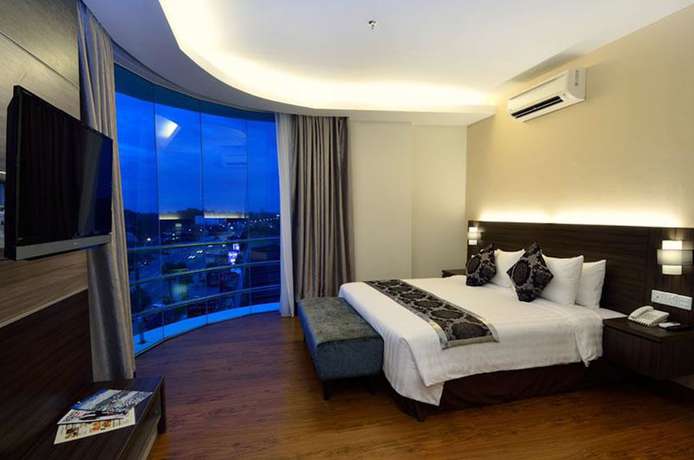Imagen de la habitación del Hotel Holiday Villa & Suites. Foto 16