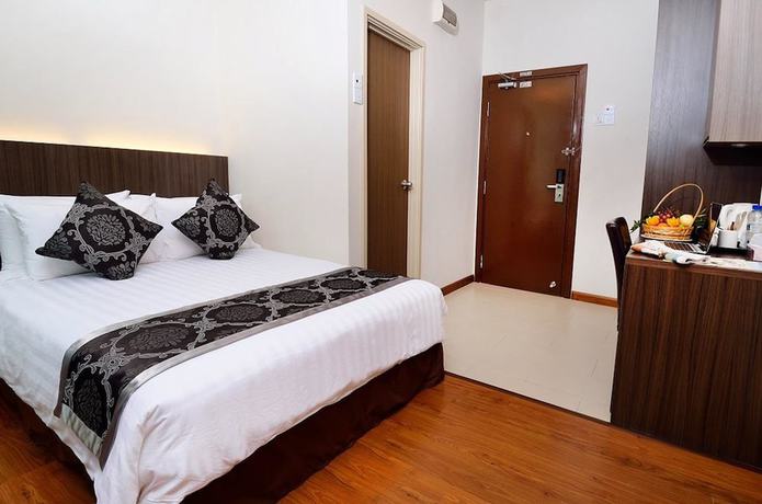 Imagen de la habitación del Hotel Holiday Villa & Suites. Foto 17