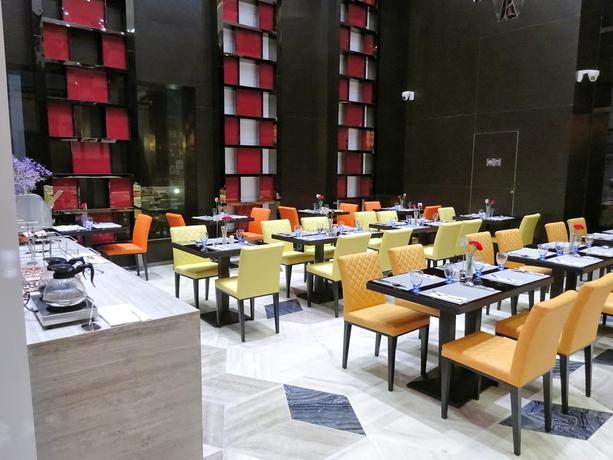 Imagen de los interiores del Hotel Holiday Villa and Residence. Foto 8