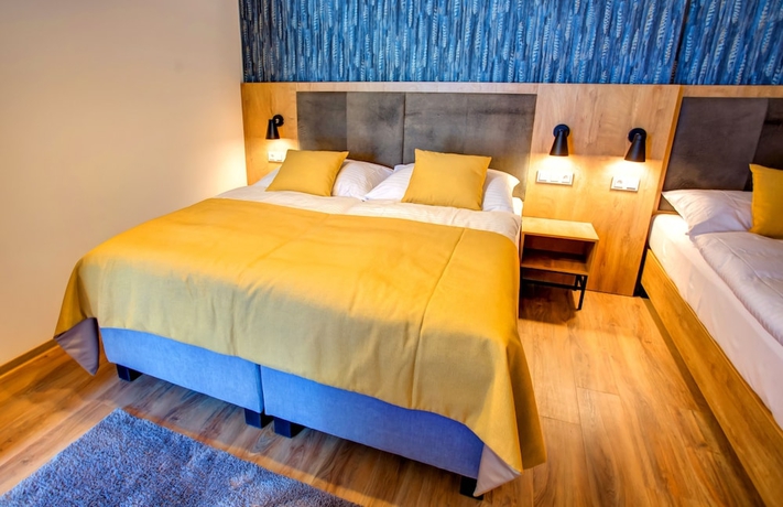 Imagen de la habitación del Hotel Holiday Village Tatralandia. Foto 8