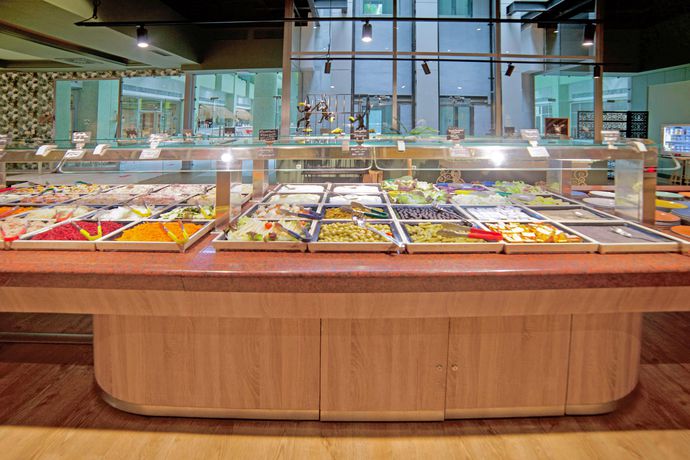 Imagen del bar/restaurante del Hotel Holiday World Riwo Affiliated By Melia. Foto 4