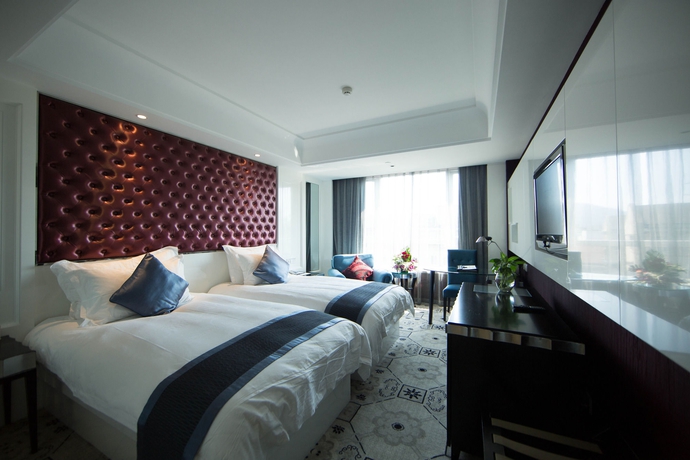 Imagen de la habitación del Hotel Holiday Wuyang Hangzhou. Foto 4