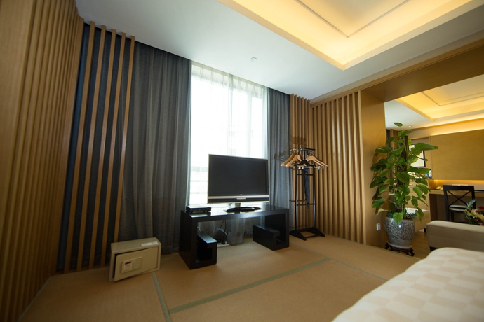 Imagen de la habitación del Hotel Holiday Wuyang Hangzhou. Foto 5