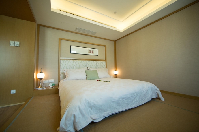 Imagen de la habitación del Hotel Holiday Wuyang Hangzhou. Foto 7