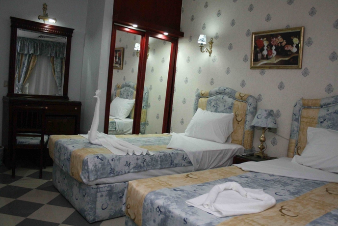 Imagen de la habitación del Hotel Holidays Express. Foto 8