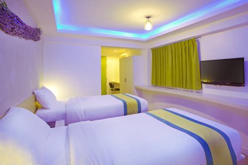 Imagen de la habitación del Hotel Holidays Home. Foto 3