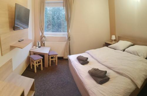 Imagen de la habitación del Hotel Holidays, Słubice. Foto 19