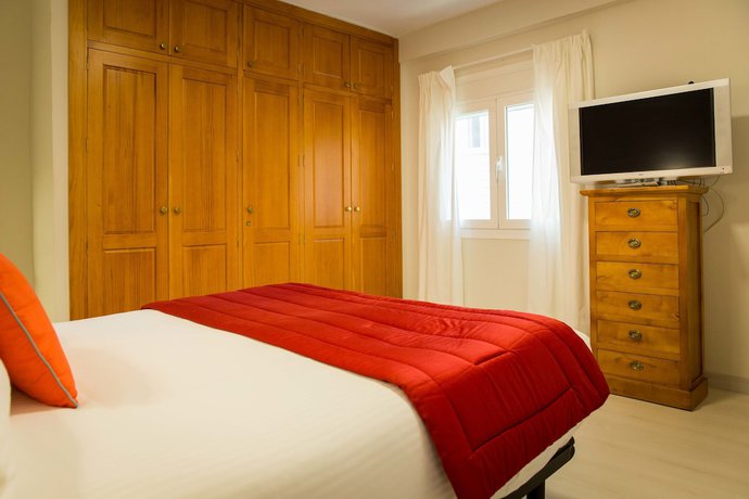 Imagen de la habitación del Hotel Holidays2Malaga City Center Apartments. Foto 13