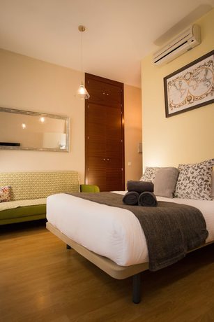 Imagen de la habitación del Hotel Holidays2Malaga City Center Apartments. Foto 16