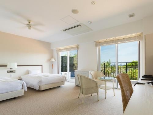 Imagen de la habitación del Hotel Holistic Resort. Foto 8