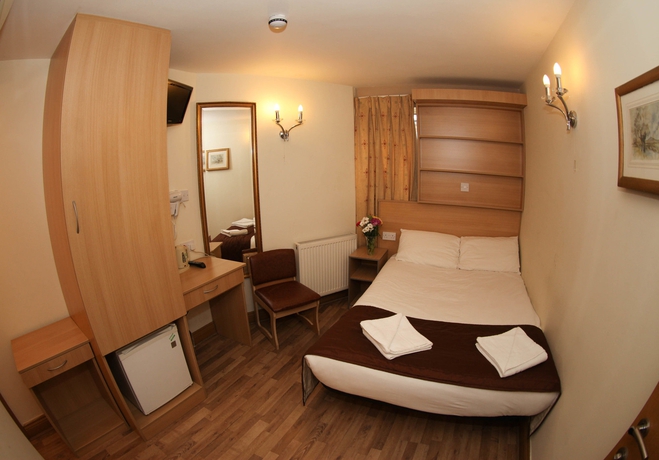 Imagen de la habitación del Hotel Holland Court. Foto 11