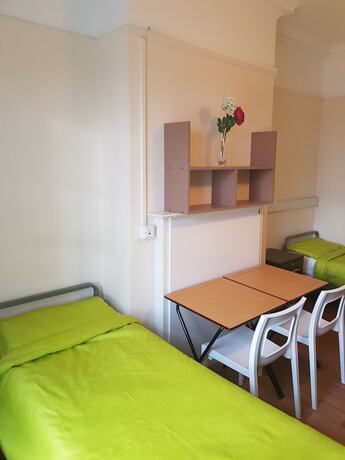 Imagen de la habitación del Hotel Holland House - Hostel. Foto 13
