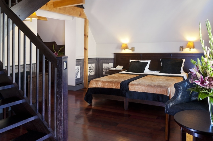 Imagen de la habitación del Hotel Holland House Residence Old Town. Foto 3