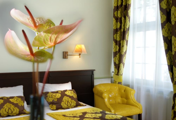 Imagen de la habitación del Hotel Holland House Residence Old Town. Foto 8