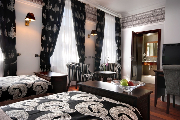 Imagen de la habitación del Hotel Holland House Residence Old Town. Foto 11