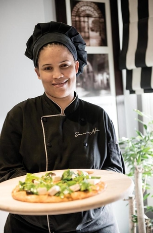 Imagen del bar/restaurante del Hotel Hollow On The Square City. Foto 3