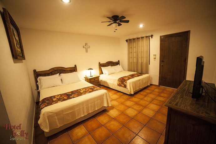 Imagen de la habitación del Hotel Holly. Foto 2